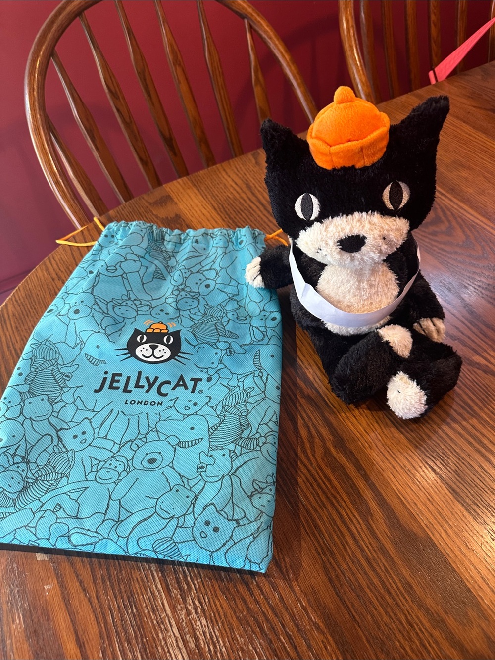 Jellycat Black and Cream Cat Plush with Orange Hat